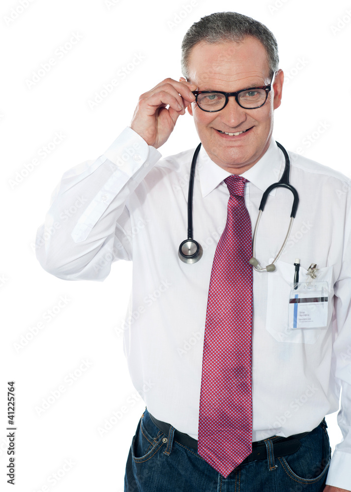 Mature medical professional, indoors studio shot Mature medical professional, indoors studio shot
