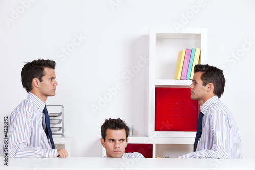 Three businessman at the office