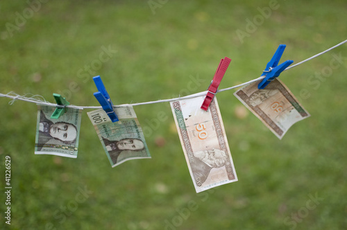 Money on clothesline photo