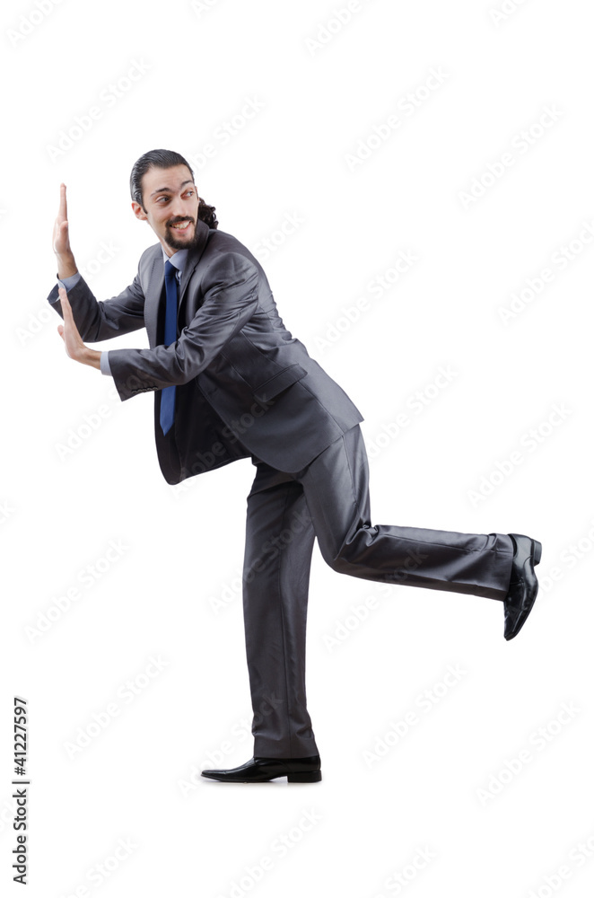 Businessman pushing away virtual obstacles Businessman pushing away virtual obstacles