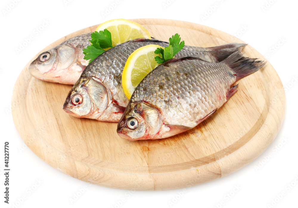 Fresh fishes with lemon and parsley Fresh fishes with lemon and parsley