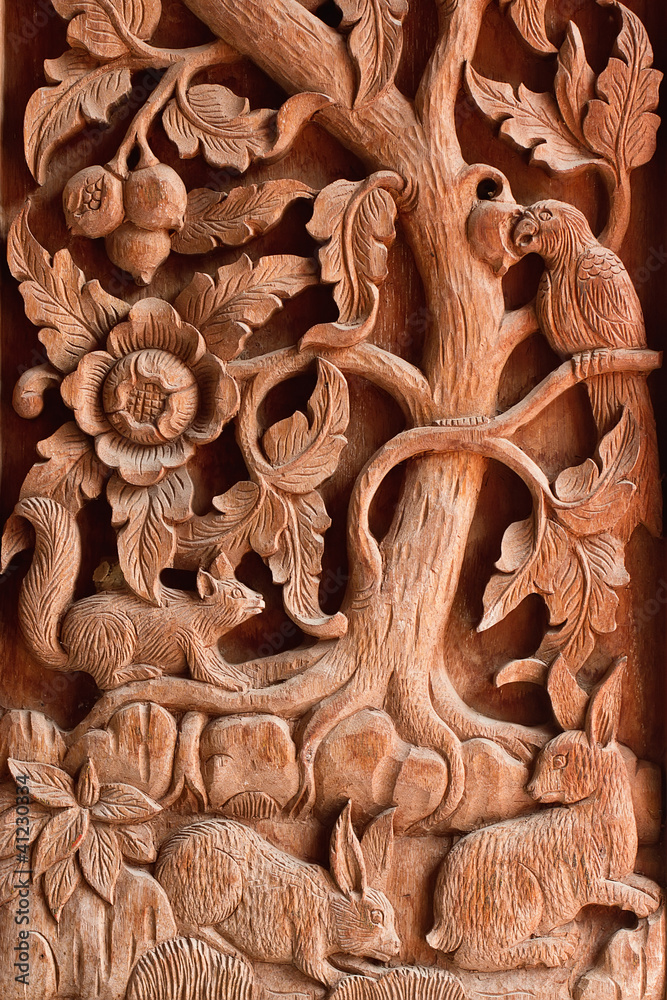 Wood carving in a thai temple.