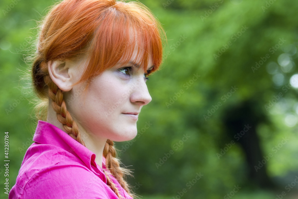 portrait of beautiful red-haired girl