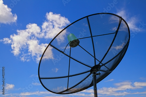 Satellite dish in morning sky