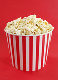 Popcorn in red and white cardboard box for cinema