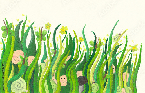 Cute dwarfs poking out of grass
