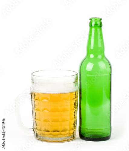 Beer green bottle and glass isolated on a white