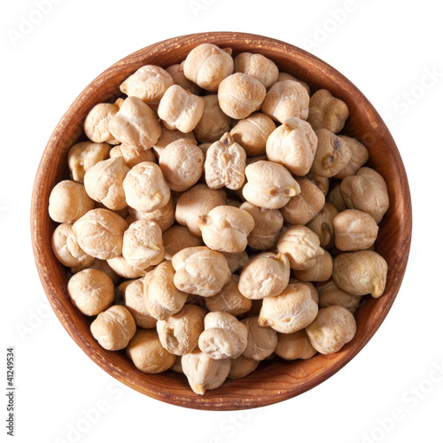 wooden bowl full of chickpeas isolated on white