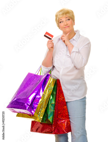Senior woman with bags and credit card