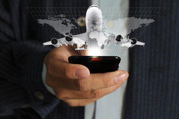 business man hand use mobile phone streaming travel around the w