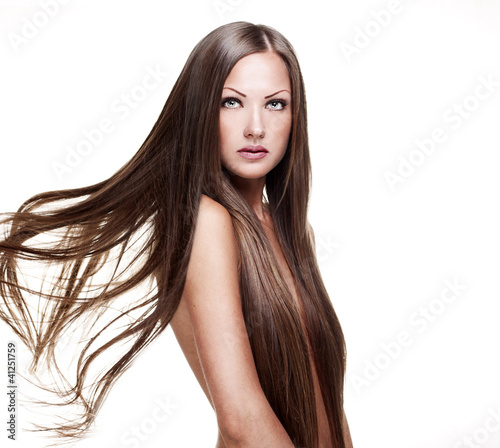 young woman with elegant long healthy shiny hair