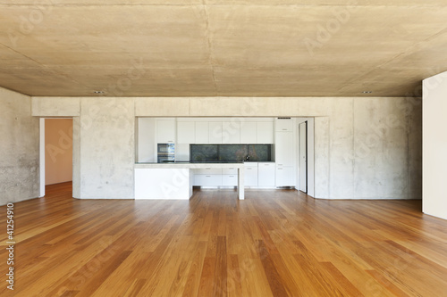 modern concrete house with hardwood floor, kitchen