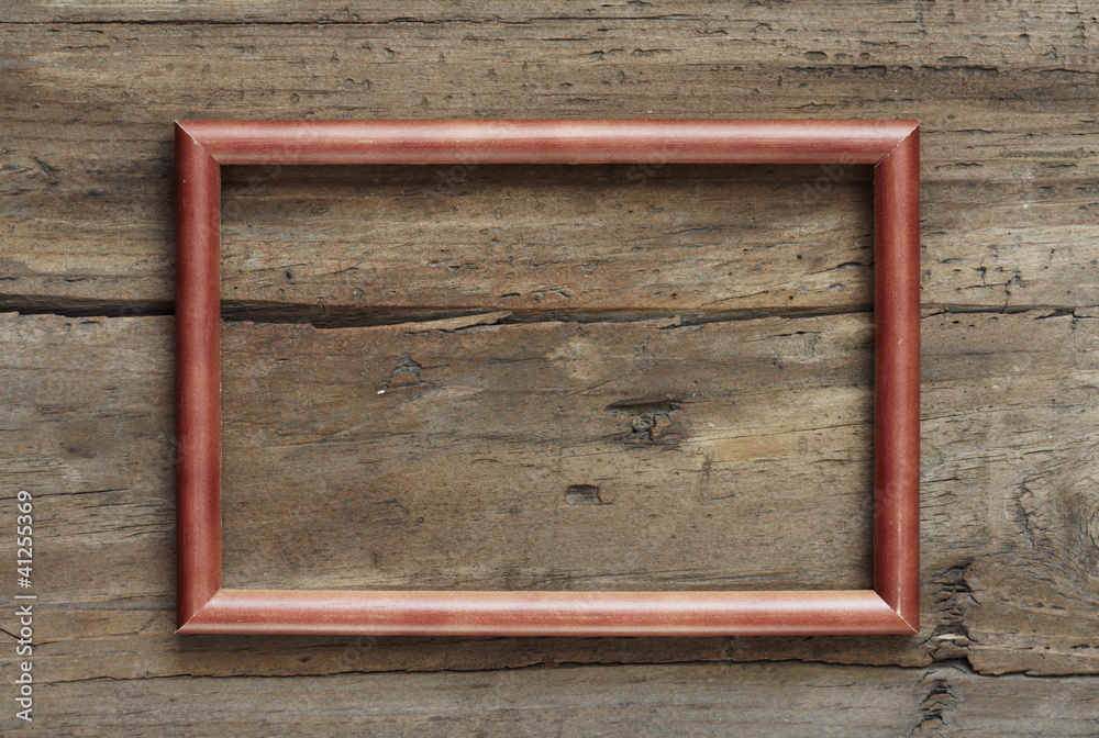 photo frame on wooden wall