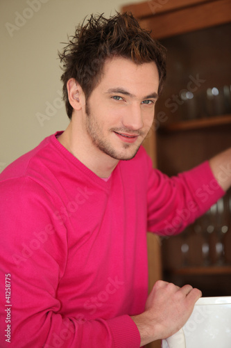 Casual young man at home
