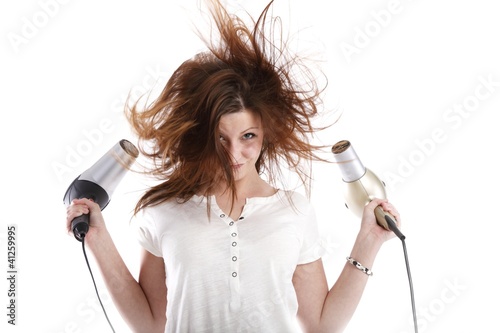wild woman with two hairdryer (white background)) photo