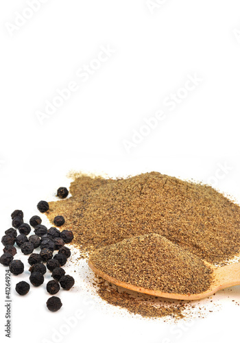 powdered and whole black pepper