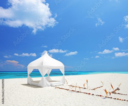 Fototapeta Naklejka Na Ścianę i Meble -  A view of a wedding tent on a beach in Maldives