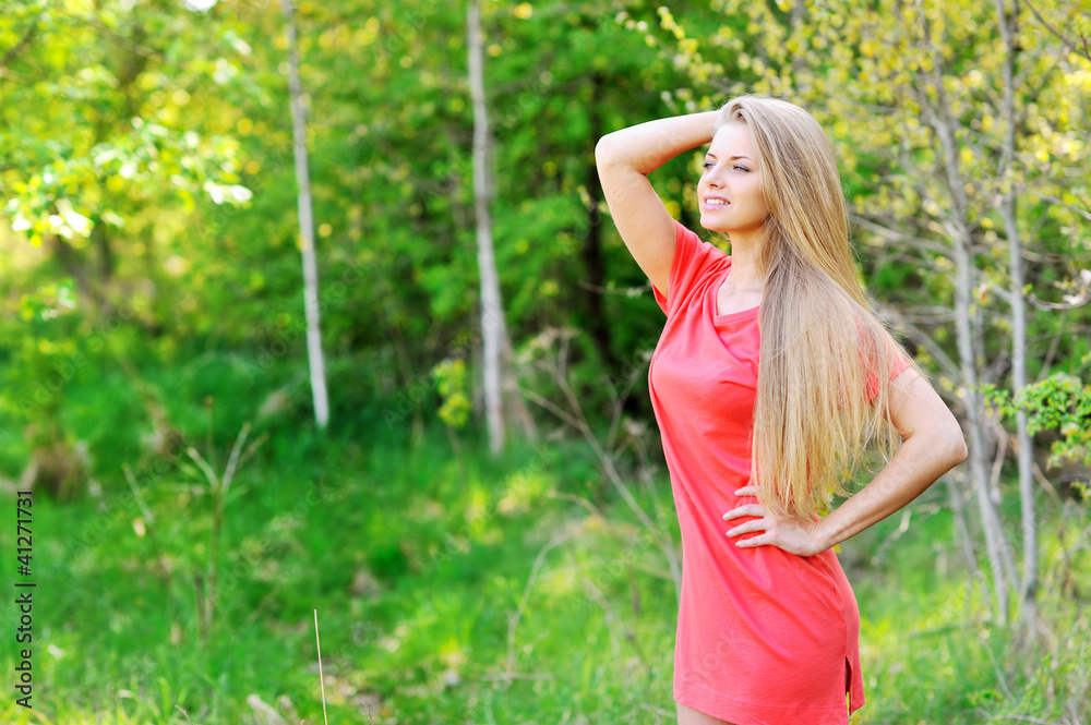 Portrait of a beautiful young woman relaxing outdoors Portrait of a beautiful young woman relaxing outdoors