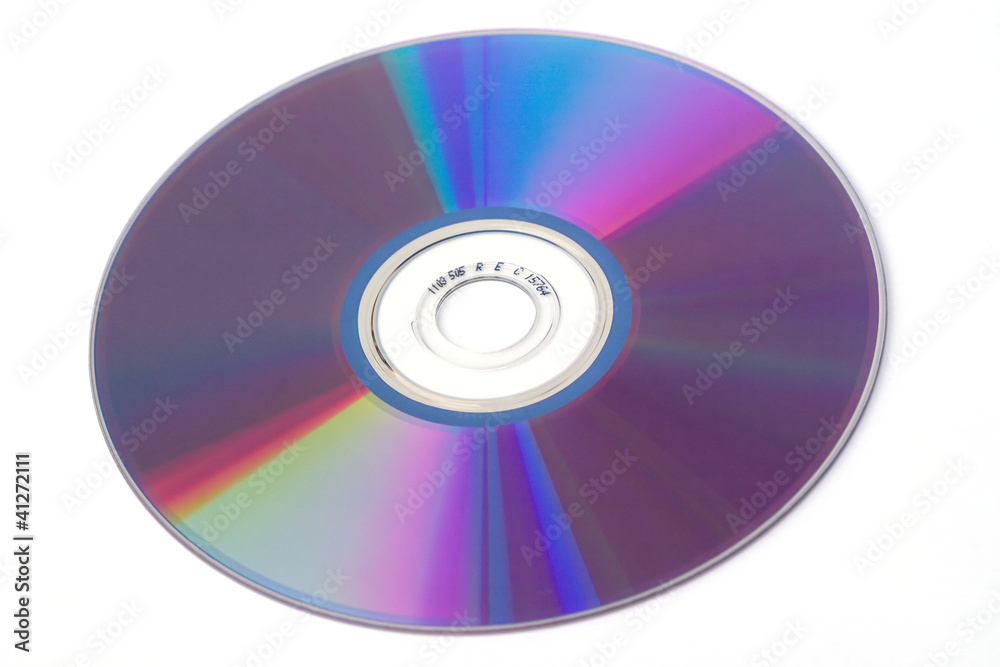 Computer cd dvd disks isolated on white closeup Computer cd dvd disks isolated on white closeup