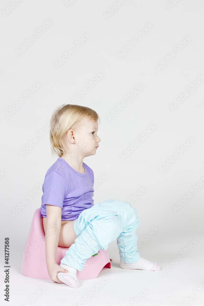 little girl using potty little girl using potty
