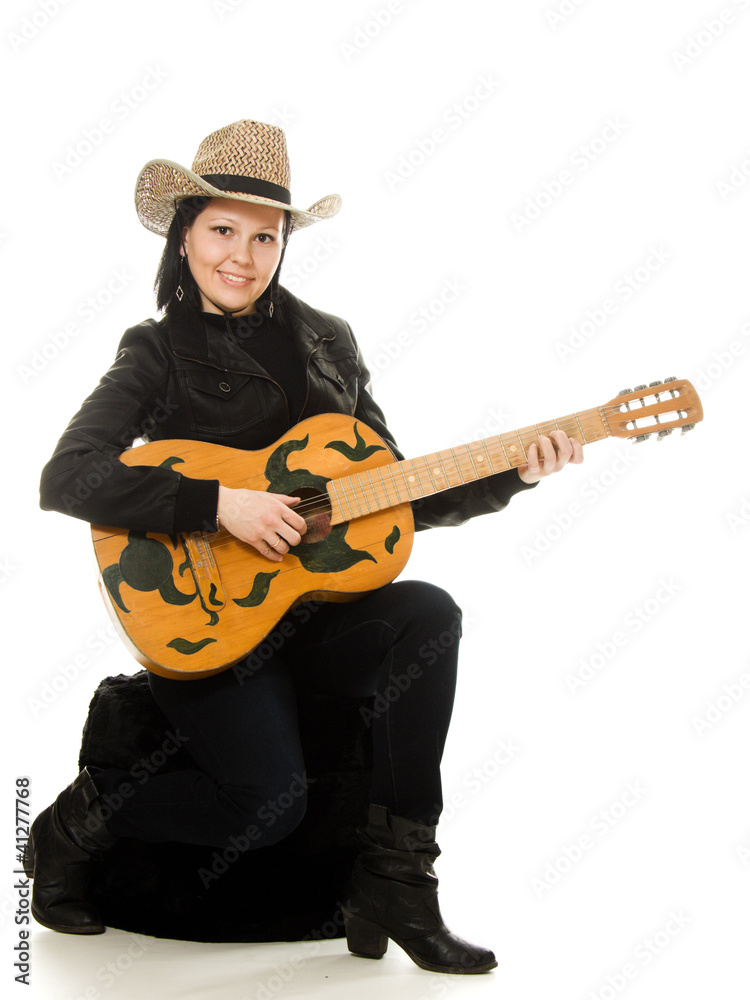 cowgirl in ahat with acoustic guitar cowgirl in ahat with acoustic guitar