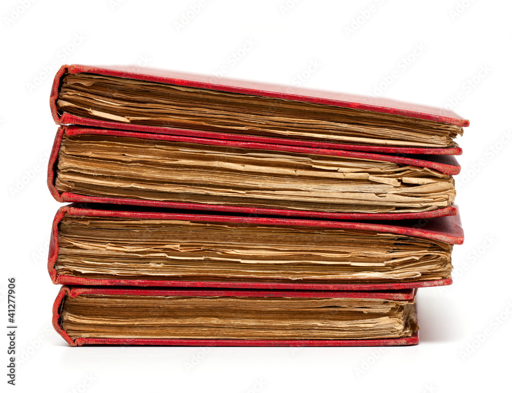 stack of old books with red covers stack of old books with red covers
