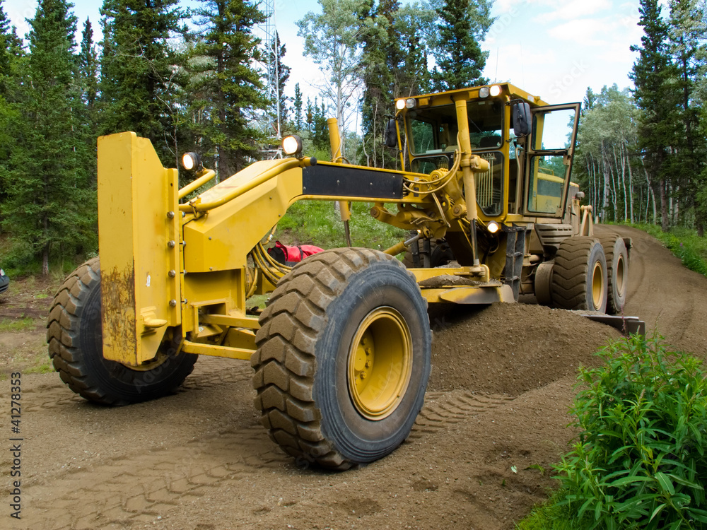 Grader resurfacing narrow rural road Grader resurfacing narrow rural road