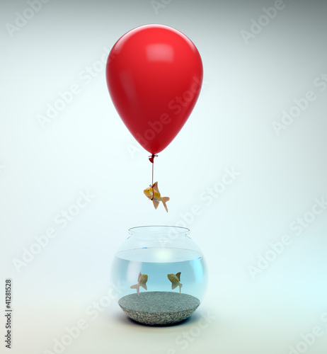 Gold fish flying away from a fishbowl