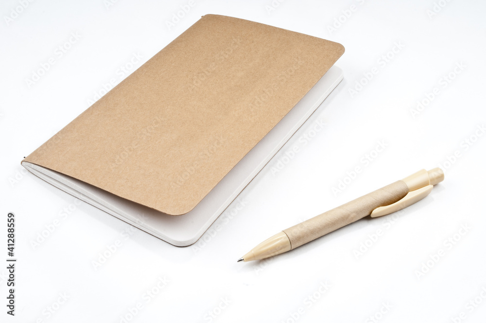 Empty scrapbook and pen on the white backgroud Empty scrapbook and pen on the white backgroud