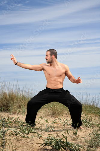 young male fighter exercise outdoor