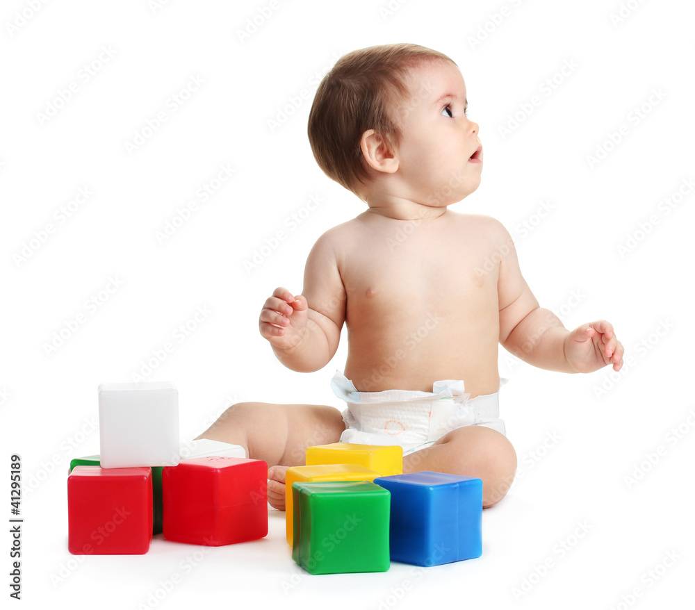 Cute baby girl playing with cubes isolated on white Cute baby girl playing with cubes isolated on white