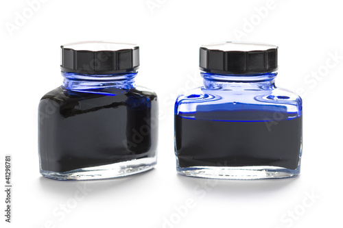 two bottles of blue ink