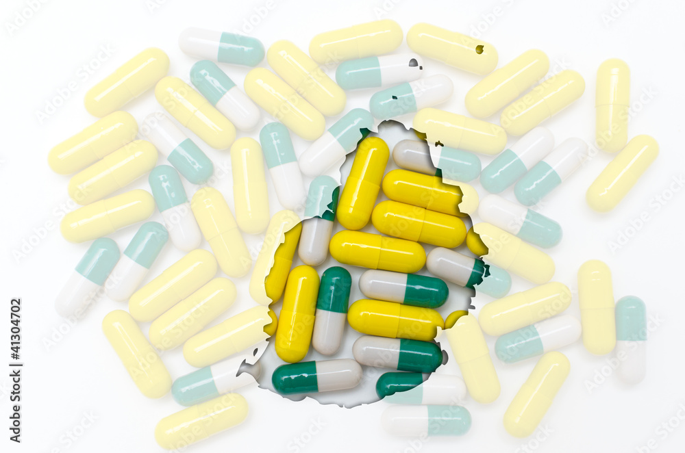 Outline map of mauritius with pills in the background for health Outline map of mauritius with pills in the background for health