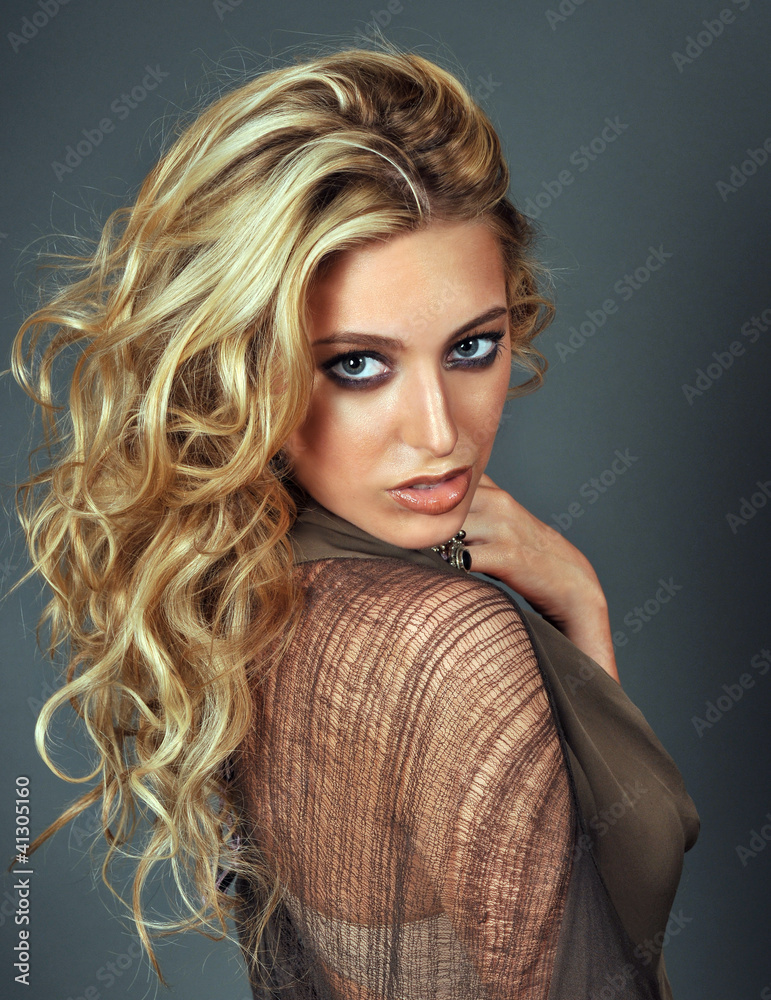 Beautiful blonde girl with messy hair pose sexy Stock Photo | Adobe Stock