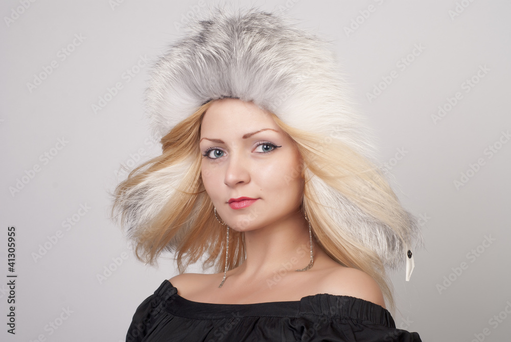 Beautiful young woman in fur hat Beautiful young woman in fur hat