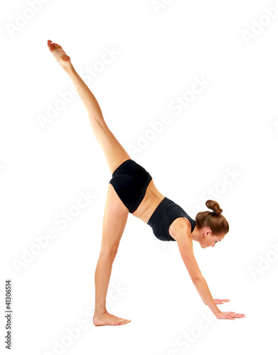 Gymnast girl in flexible back pose, isolated on white background