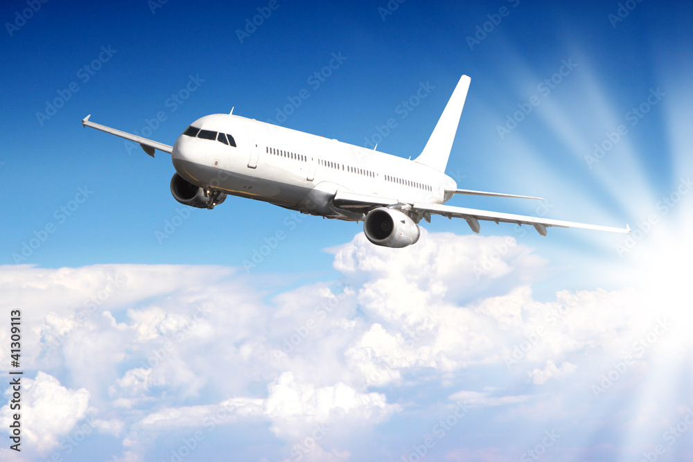 Big jet plane flying above clouds Big jet plane flying above clouds