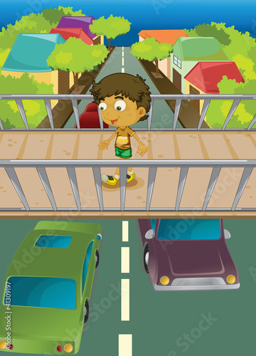 Boy on overpass
