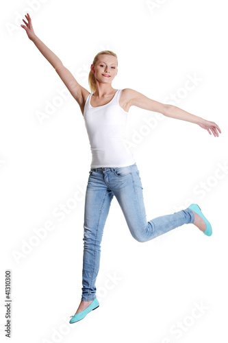 Jumping happy teen girl © Piotr Marcinski