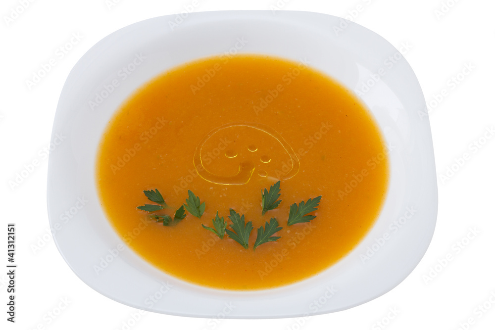 pumpkin soup with parsley in white plate pumpkin soup with parsley in white plate