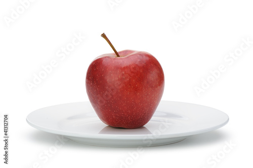 Red apple on plate