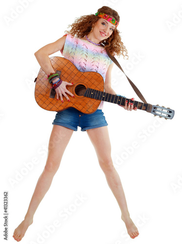 woman in hippie outfit jumping