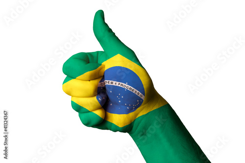 brazil national flag thumb up gesture for excellence and achieve