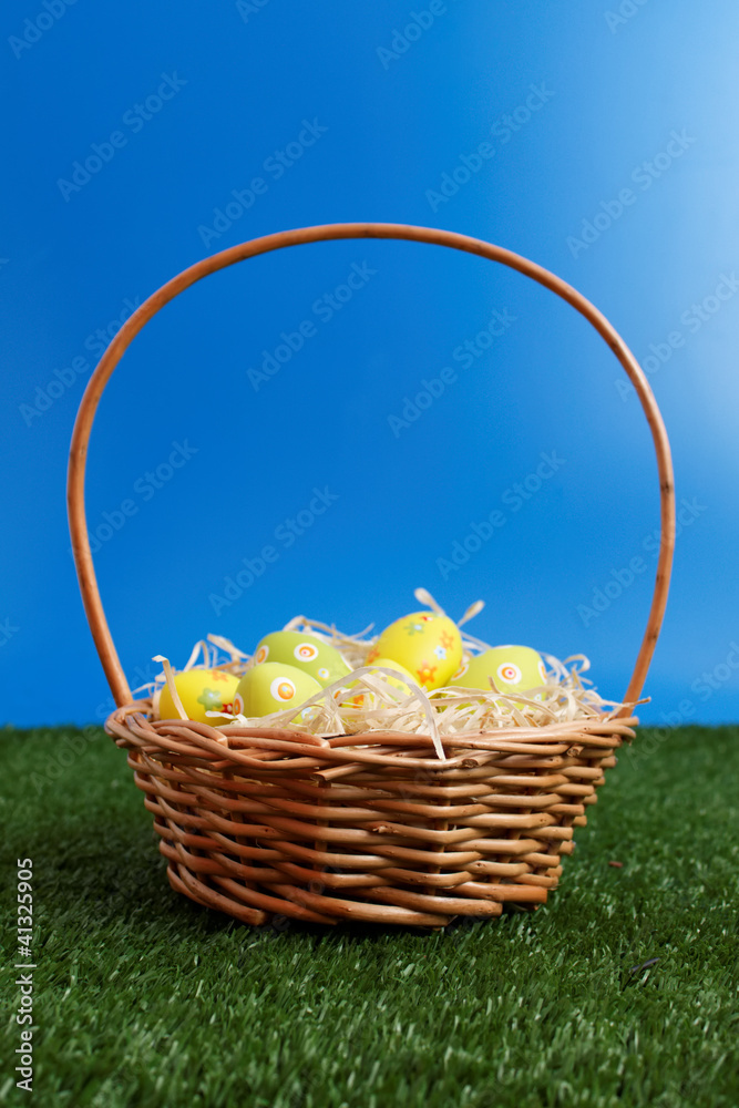 Wicker basket with easter eggs