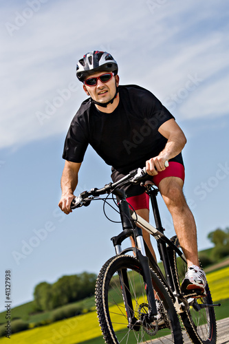 cycling man © Val Thoermer