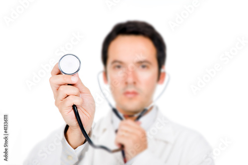 Doctor holding stethoscope on white background