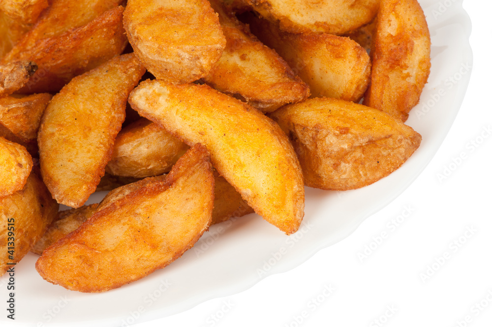 Fried potato wedges isolated on white background Fried potato wedges isolated on white background