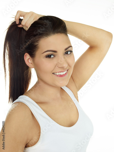 Beautiful girl with ponytail hairstyle on white background