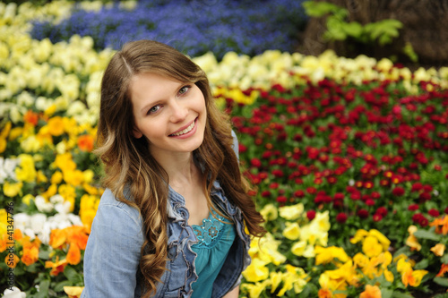spring: young woman and flowers © mangostock