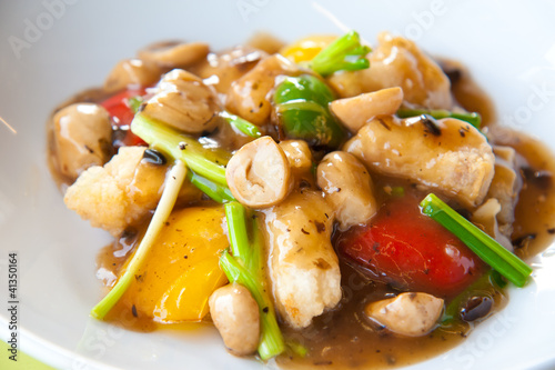 Stir-fried fish with colorful vegetables, mushroom and herb